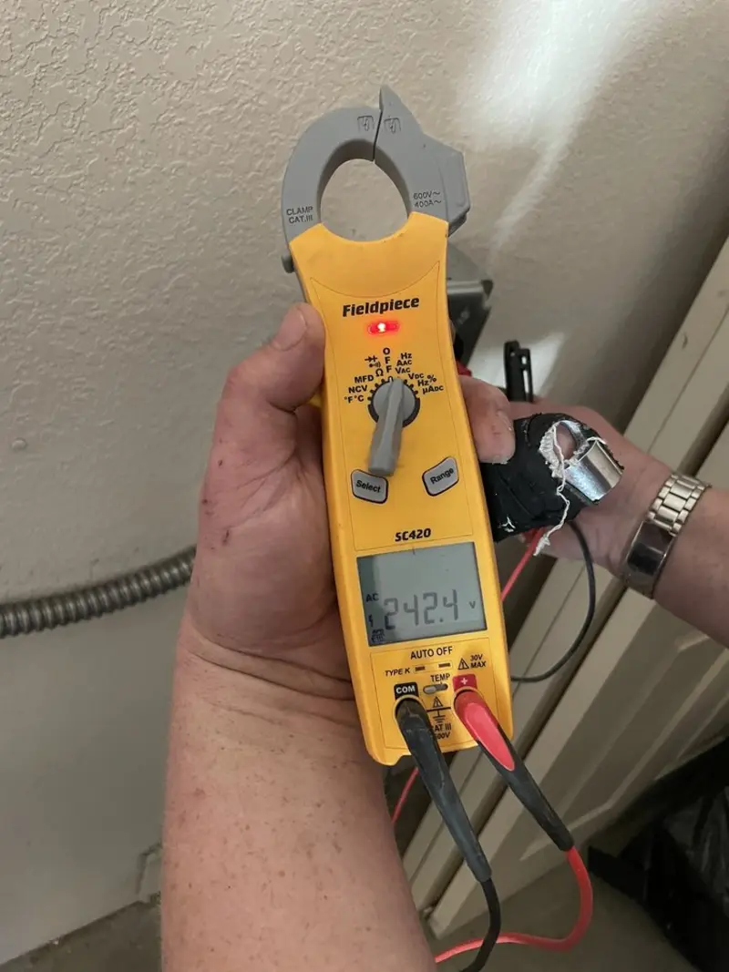 Voltage testing with clamp meter during Generator Installation in Shady Side